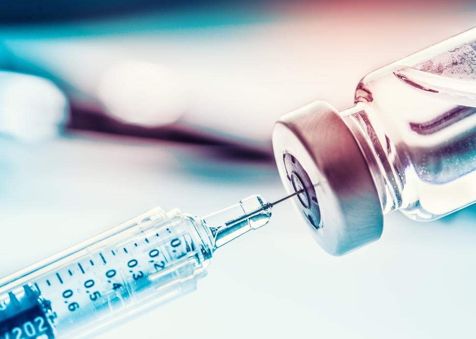 syringe and bottle mrna vaccine.jpg